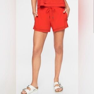Athleta Baja Shorts. Pull on/drawstring waist & laser cut details. Size 10. EUC.